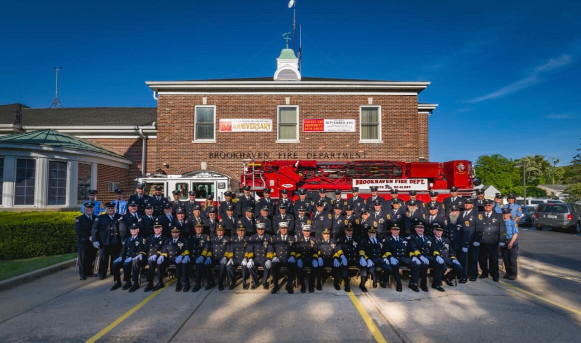 Members of the Brookhaven Fire Department gather outside the firehouse for a photo on Memorial Day 2023. The current firehouse on Montauk Highway opened in 1946 and was expanded in 1982.